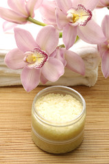 Fototapeta na wymiar Spa essentials (salt, white towel and pink orchids)
