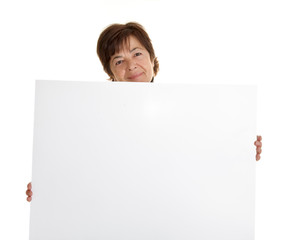 Woman holding a white pannel