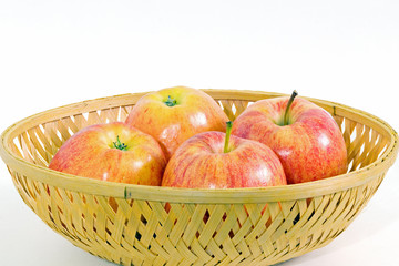 four apples in a basket