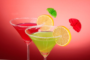 Martini glasses on red background
