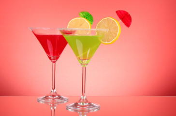 Martini glasses on red background