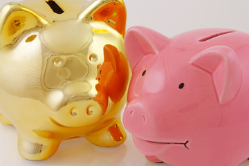 gold and pink piggy banks