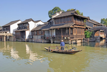 Fototapeta premium Fishing with cormorants at Shanghai Xizha old village