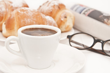 morning newspaper with black coffee