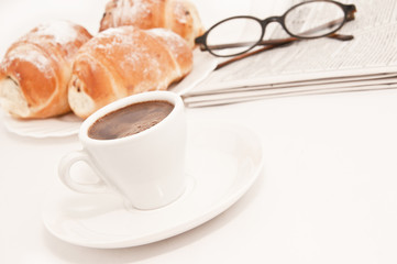 morning newspaper with black coffee