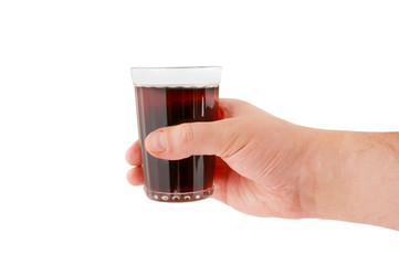 Glass with red wine in hand
