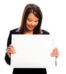 Fototapeta premium Businesswoman holding a white board
