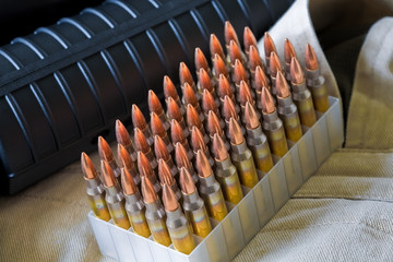 Close-up of AR-15 rifle and ammo