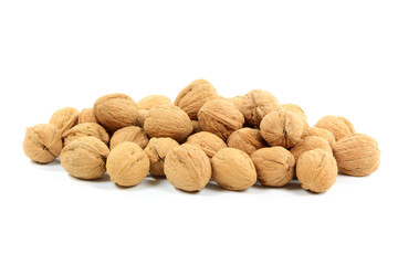 Pile Unshelled Walnuts  (Nuts with shells).