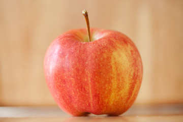 Apple on rustic wood background