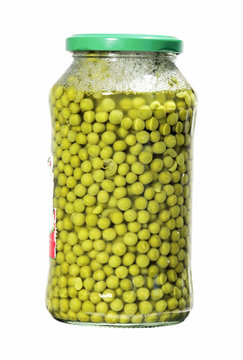 jar with green peas isolated over white