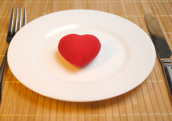 Red heart served on the plate