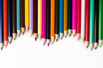 Colored pencils isolated in white