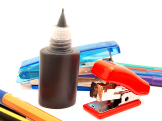 Felt-tip pens, stapler and paint
