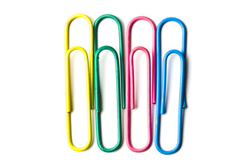 Multicolored paper clips isolated on white