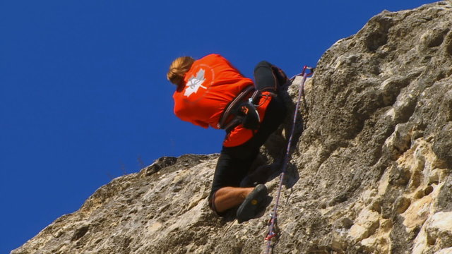 Rock climber reaches top
