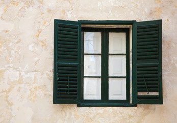 window with green shutters