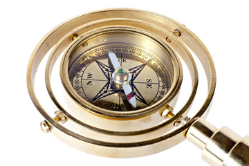 Fototapeta na wymiar Bronze compass with a handle