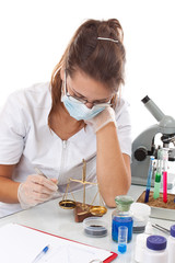 Young scientist and balance