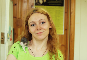 The girl with a rat on a shoulder