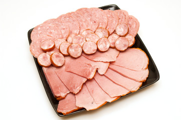 different types of sausages served sliced on a plate