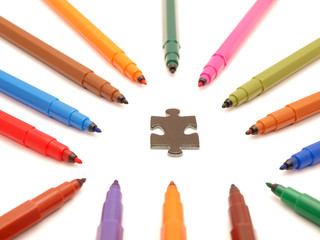 Color felt-tip pens and puzzle