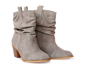 A pair of female gray boots on white background
