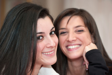 Two Smiling Teen Girls