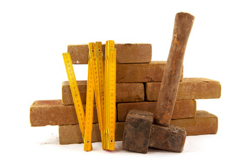 Bricks and measuring tool