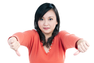 Attractive woman showing thumbs down sign