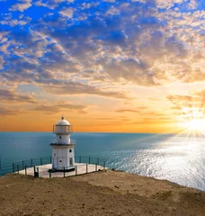 No drill light filtering roller blinds Lighthouse lighthouse on a marine cape at the sunset