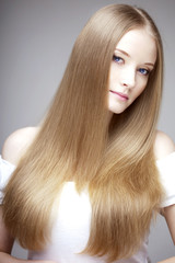Naklejka premium Girl with luxurious hair