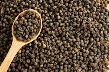 pepper and wooden spoon