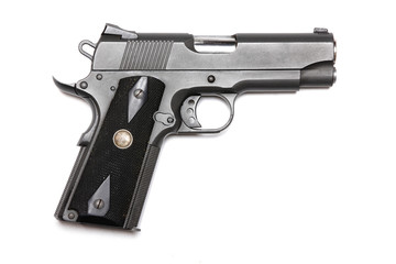 1911-family handgun with 4.3