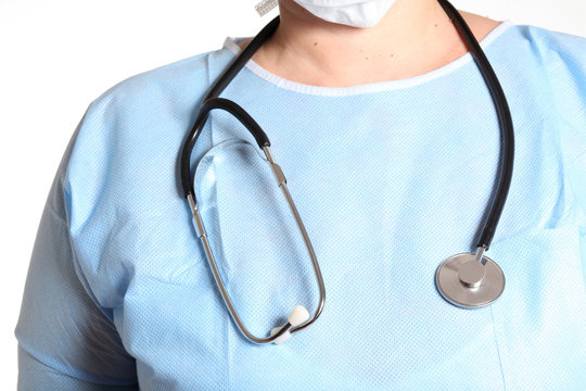Donna medico - particolare camice e stetoscopio