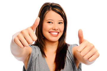 Beautiful woman shows thumbs up