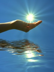hand holding sun