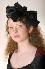 A woman dressed in old-fashioned dress