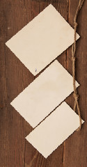 Old empty photos on wood background