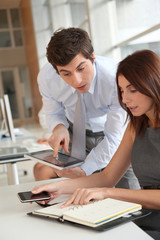 Fototapeta premium Business people working in the office with agenda