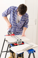 Home improvement - handyman cut tile
