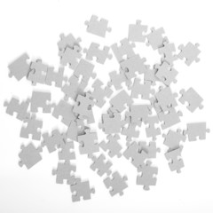 Pieces of puzzle upturned. Isolated on white
