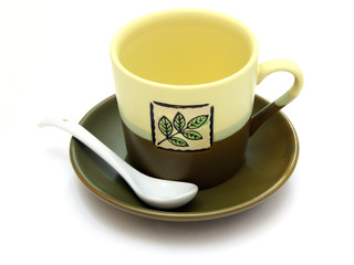 Ceramic cup on a saucer with drawing