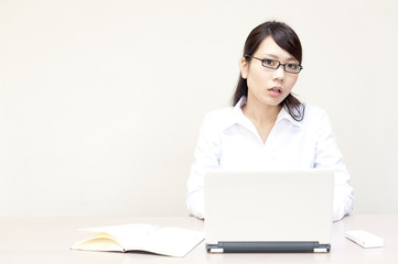 a portrait of young business woman working