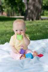 baby eating toys