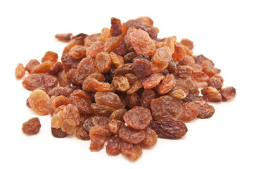 Black dried raisins isolated on white background