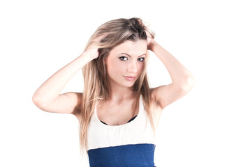 Fototapeta premium Isolated on white attractive blond young girl with long hair