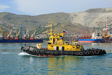 The ship floats on the Black sea about port