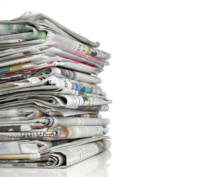 pile of news paper over white