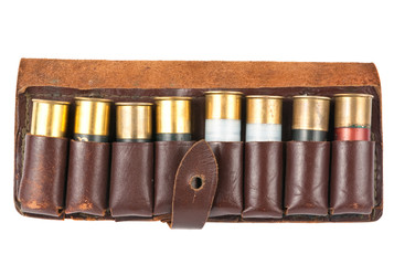 Leather bandolier with shotgun shells over white